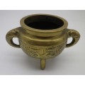 Vintage Chinese solid brass small pot on three legs with dragon motif & elephant handles