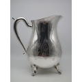 LARGE SILVER PLATED VINTAGE  JUG WITH ICE LIP LOVELY CHASED DECORATION. EXCELLENT CONDITION 20CM