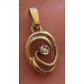 Dainty 9ct gold pendant with little tiny diamond 1.9 x 1cm 1 grm.