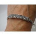 STERLING SILVER & MARCASITE BANGLE. 10.8 grms; 6.3 x 5.4 x 0.7mm. BEAUTIFUL!