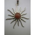 STERLING SILVER and CARNELIAN SUN SHAPED NECKLACE 12.9grms Chain: 60cm pendant: 5.7 x 4.6cm