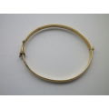FOR PRANAI ONLY PLEASE!! Vintage 9ct Gold clip bangle with bronze core.