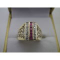 Beautiful 9ct Gold & Ruby Ring, flanked with white stone- possibly diamonds. Size: M/N. 3.1grms