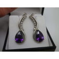 Sparkly 925 Sterling silver drop earrings with pearcut purple stones & 7 cubic zirconias. 3.5cm 6.6g