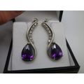 Sparkly 925 Sterling silver drop earrings with pearcut purple stones & 7 cubic zirconias. 3.5cm 6.6g