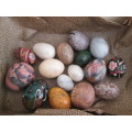 COLLECTION OF 14  EGG STONES AND 2 WOODEN EGGS