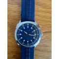 Used big-face blue Quartz watch with rubber watch band