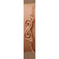 Stunning Double infinity gold plated bracelet