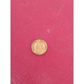 small brass token