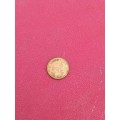 small brass token