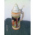 Tall German made steins with pewter lid