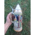 Tall German made steins with pewter lid