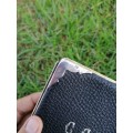 Silver and genuine Leather holder