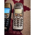 Nokia model 6310i with a original house charger as well and one phone for parts