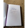 A WOMEN`S LEGACY SIGNED BY AUTHOR