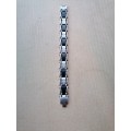 Men`s 1/4 CT. T.W. Diamond Two-Tone Stainless Steel Cross Bracelet