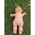 Large old kewpie doll. Needs repair to the neck area as per picture