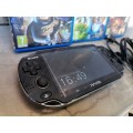 ps vita with 3 games and chargers