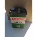 Two old castrol tins