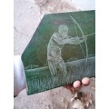 Stunning art piece on stone of a bushman