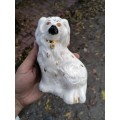 Royal Doulton dog porcelain figure. Have been repaired
