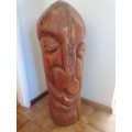 Large solid wood carving. Very heavy piece. Can collect it in Robertson western cape