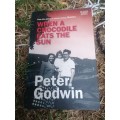 WHEN A CROCODILE EATS THE SUN - PETER GODWIN