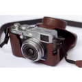 Fujifilm X100. The Fujifilm X100 styling evokes a classic film camera. The Jaguar E-Type of cameras