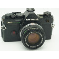 Olympus OM2 spot program.  35mm film camera