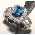 PURE PERFECTION! SOLID .925 STERLING SILVER RING WITH SAPPHIRE AND SIMULATED DIAMONDS!