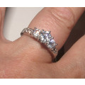 PURE PERFECTION! SOLID .925 STERLING RING WITH SIMULATED DIAMONDS!