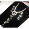 RHINESTONE ENCRUSTED SILVER NECKLACE AND EARRINGS SET