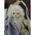 VINTAGE SMALL CLOWN DOLL ON SWING