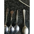 4 DIFFERENT COLECTABLE SPOONS