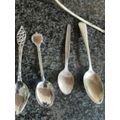 4 DIFFERENT COLECTABLE SPOONS