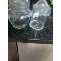 2 VINTAGE GLASS HOLDERS WITH LIDS