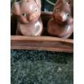 Vintage pig salt and pepper shakers in tray