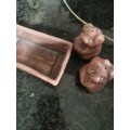 Vintage pig salt and pepper shakers in tray