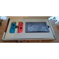Nintendo Switch Console Gen 1 Neon Blue Red and Carry Case and Original Accessories