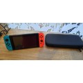 Nintendo Switch Console Gen 1 Neon Blue Red and Carry Case and Original Accessories