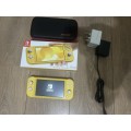 Nintendo Switch Lite (Yellow) with case  + Original UK Charger