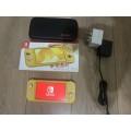 Nintendo Switch Lite (Yellow) with case  + Original UK Charger