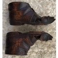 CARVED ANTIQUE PAIR OF WOODEN BOOTS WITH BRASS INSERT