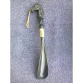 Vintage shoe horn with handle shaped like a horse's head, original box