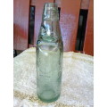 Glass bottle with marble inside, Crystal Springs Johannesburg, 23cm