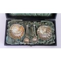 Early Pair of Cased Silver Plate Shell-Shaped Footed Salts and Spoons.