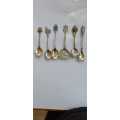 Vintage Silver plated collectable spoons on wall stand