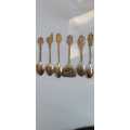 Vintage Silver plated collectable spoons on wall stand