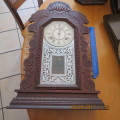 very attractive Ansonia clock, silvered glass, wooden case, in working order, sold as is, as photo