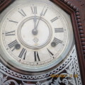 very attractive Ansonia clock, silvered glass, wooden case, in working order, sold as is, as photo